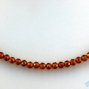 Náhrdelník z broušeného granátu hessonit QA, kuličky cca 3 - 4 mm (GR3630B)